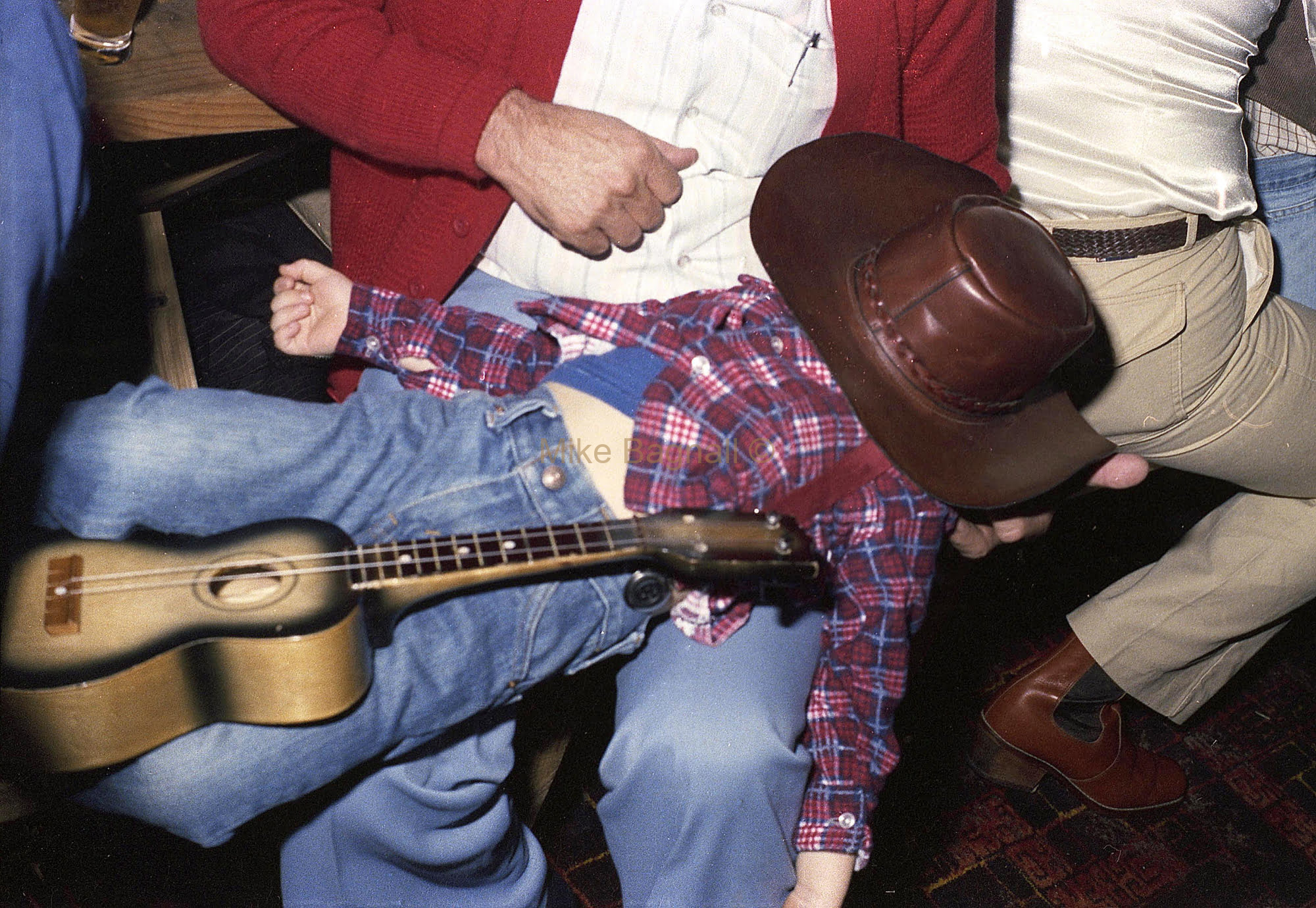 05_Elaine_Benfit_Night_23-Cowboy Clint White falls asleep on dads lap,023